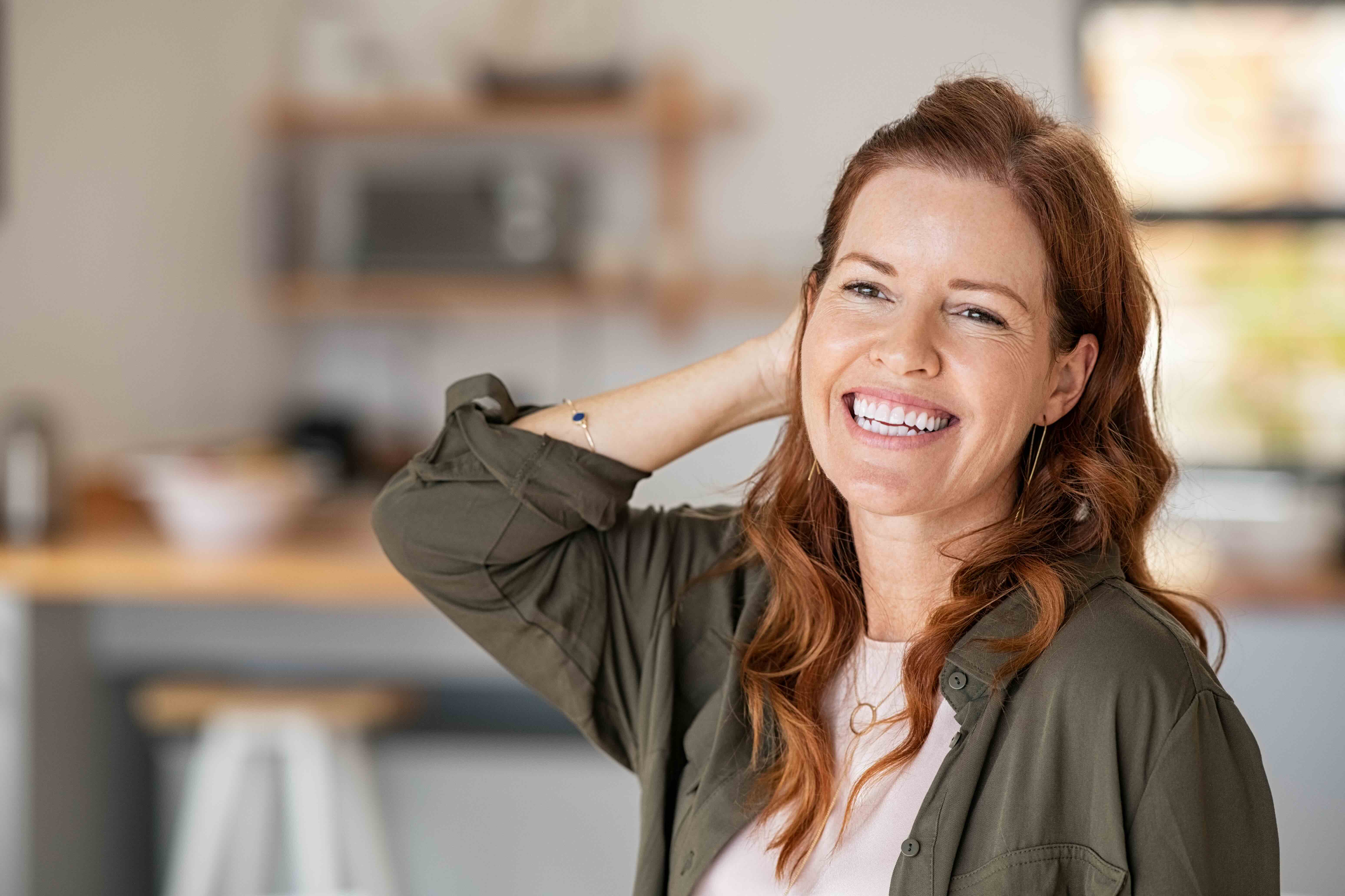 Smiling woman in her kitchen